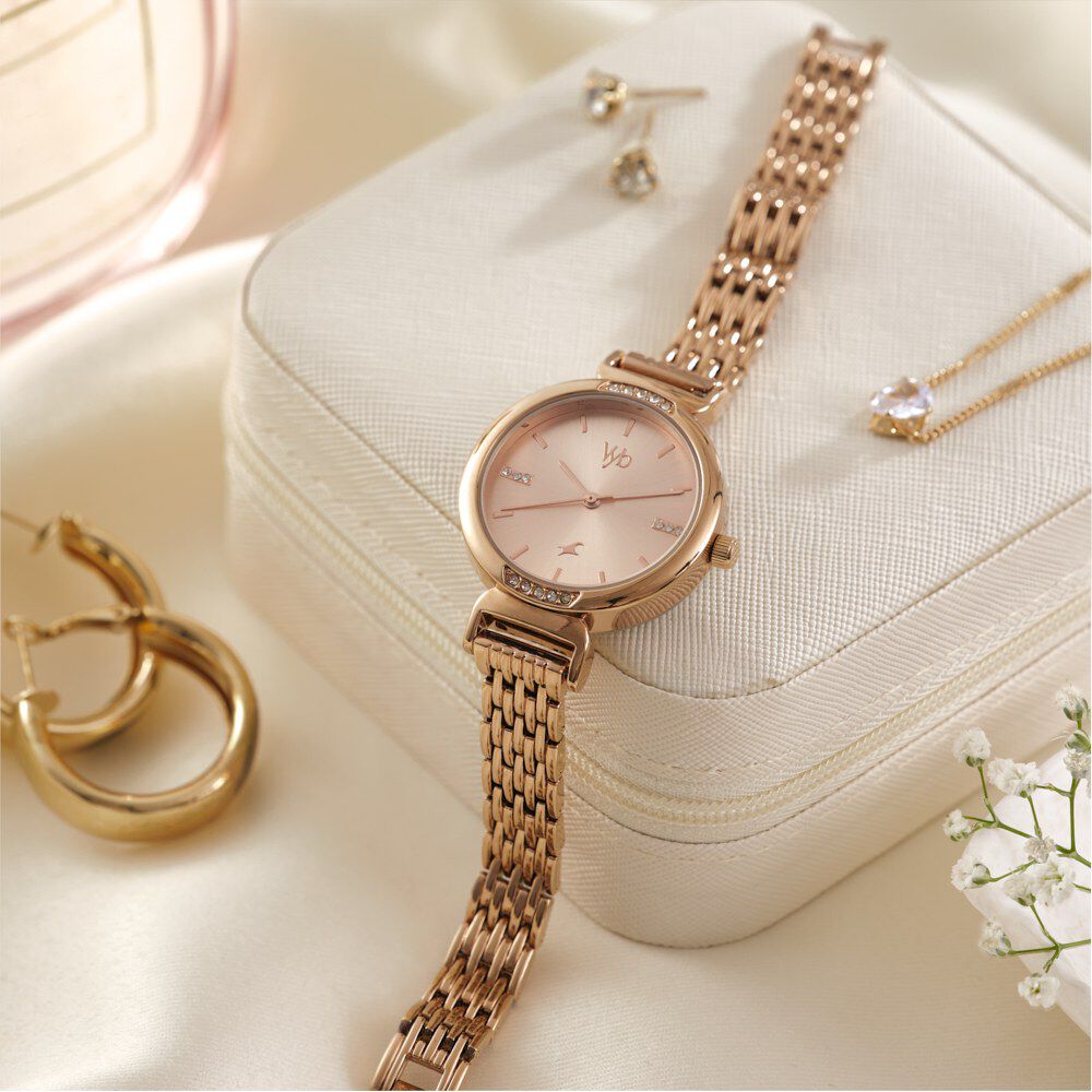 Fastrack Vyb Charmer Quartz Analog Rose Gold Dial Rose Gold Color Metal Strap Watch For Girls