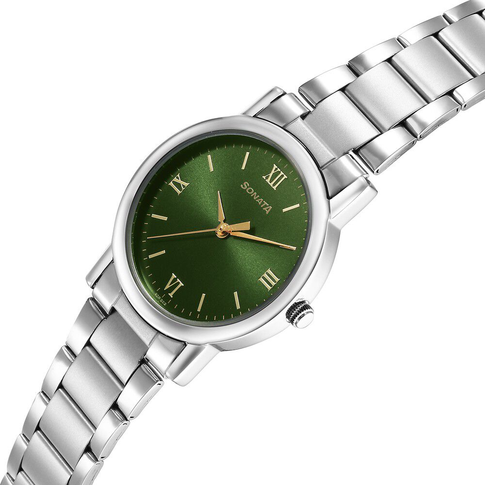 Silver watch top green dial